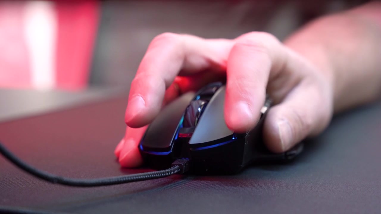 Person's Hand Operating a Gaming Computer Mouse