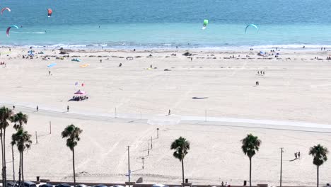 kiteboaders all along the waterfront at long beach, california - aerial