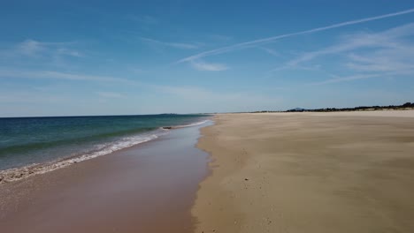 a 4k drone aerial view of a coastal desert beautiful beach in portugal algarve