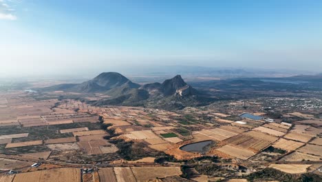 Morelos-Valley-Mountain-Scenery-in-Mexico,-Aerial-Drone-Establishing-Nature-Shot-with-Copy-Space-in-Blue-Sky