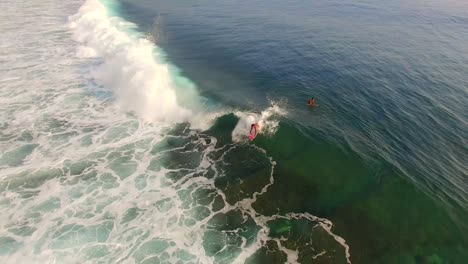 tracking a surfer catching a wave