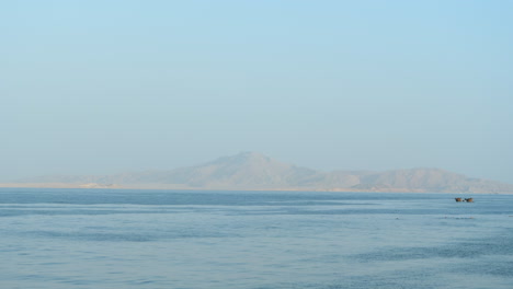 beautiful seascape with tiran island in background. static