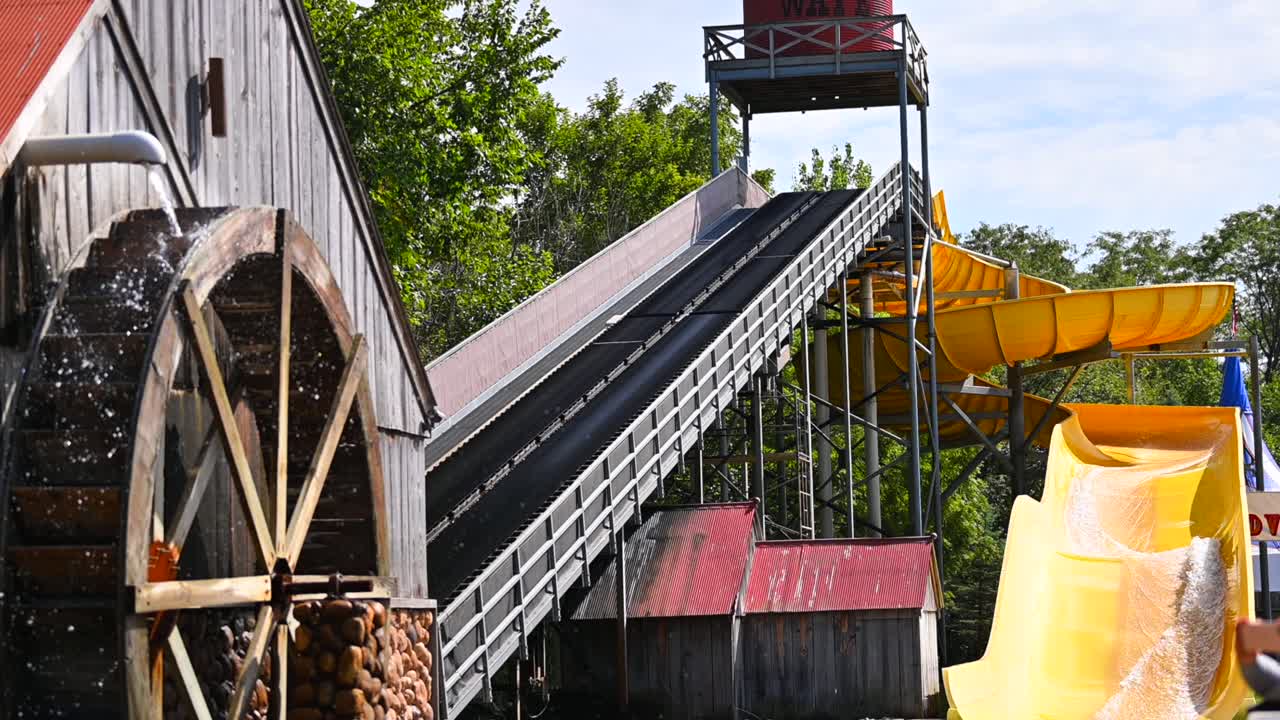 Water Park slides and spinning wheel water mill