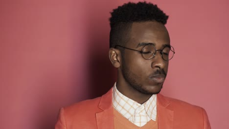 stylish black man smiling widely for camera