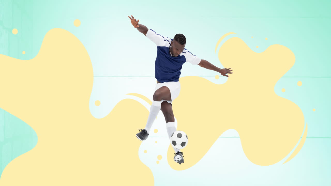 Animation of football player with ball over yellow splodges on green ...