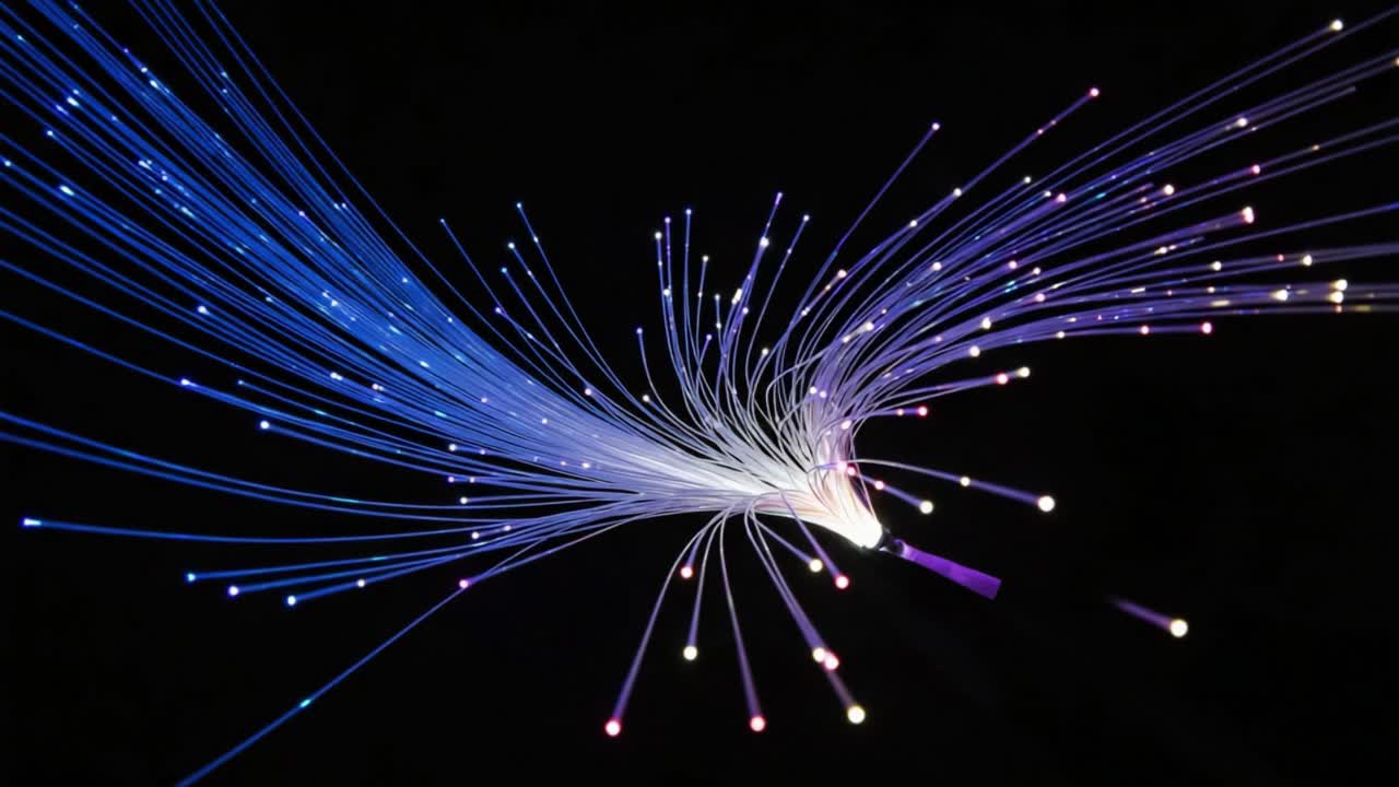 Vibrant Display of Light and Color from Fiber Optic Filaments Creating a Dynamic Visual Experience Against a Dark Background