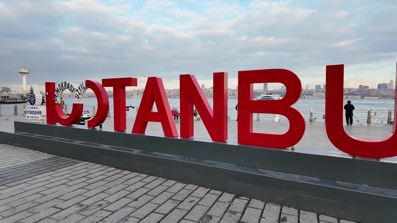 Istanbul Waterfront View with Red Sign