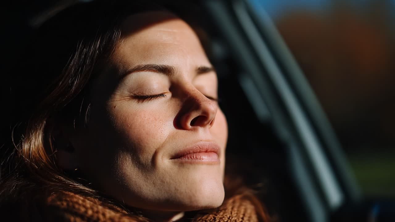 A Serene Moment: Enjoying the Warmth of the Sunlight Through the Car Window, Embracing Peace and Calm While Relaxing in Nature's Glow