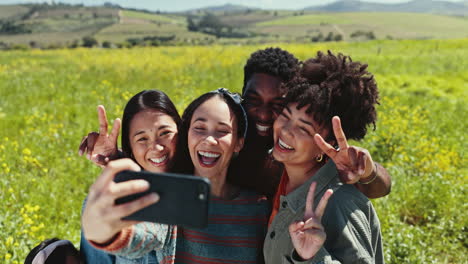 selfie, friends and peace sign with a group