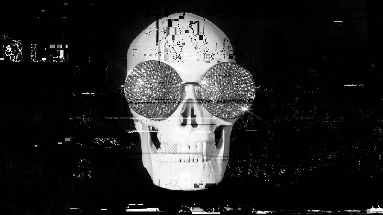 cranio umano con occhiali da sole