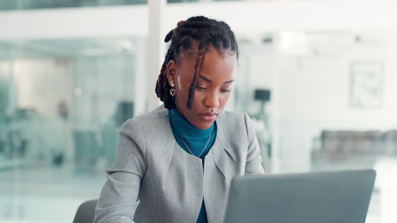 Thoughtful Businesswoman in Modern Office