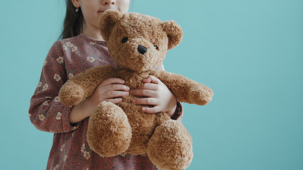 Cute Girl with Plush Bear