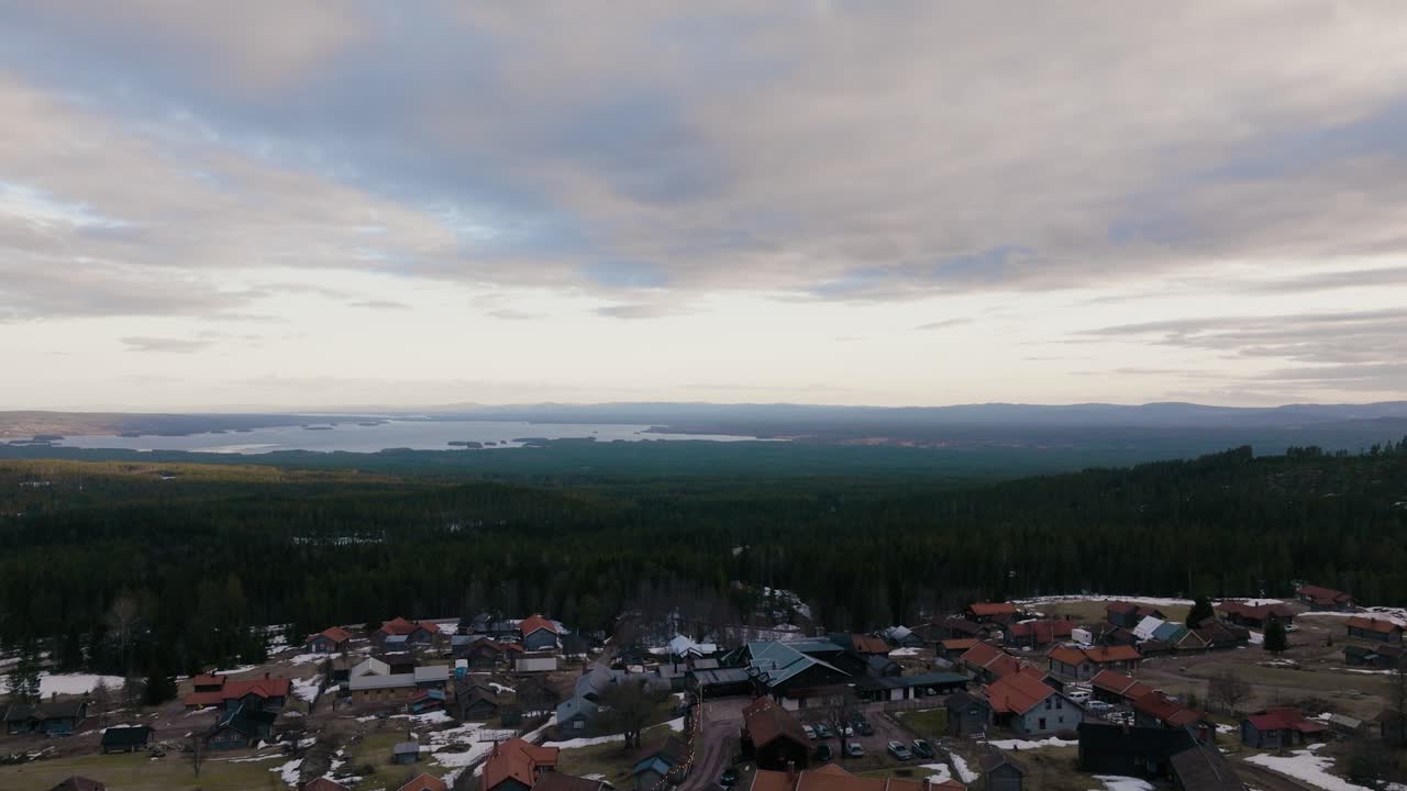 Drone ascend over smal Swedish village in Dalarna, Sweden