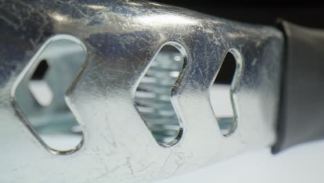 a clamp with macro video close up moving in a circle.