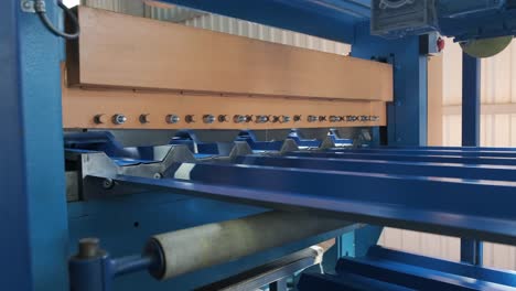 metal sheet forming machine at the modern metalwork factory.