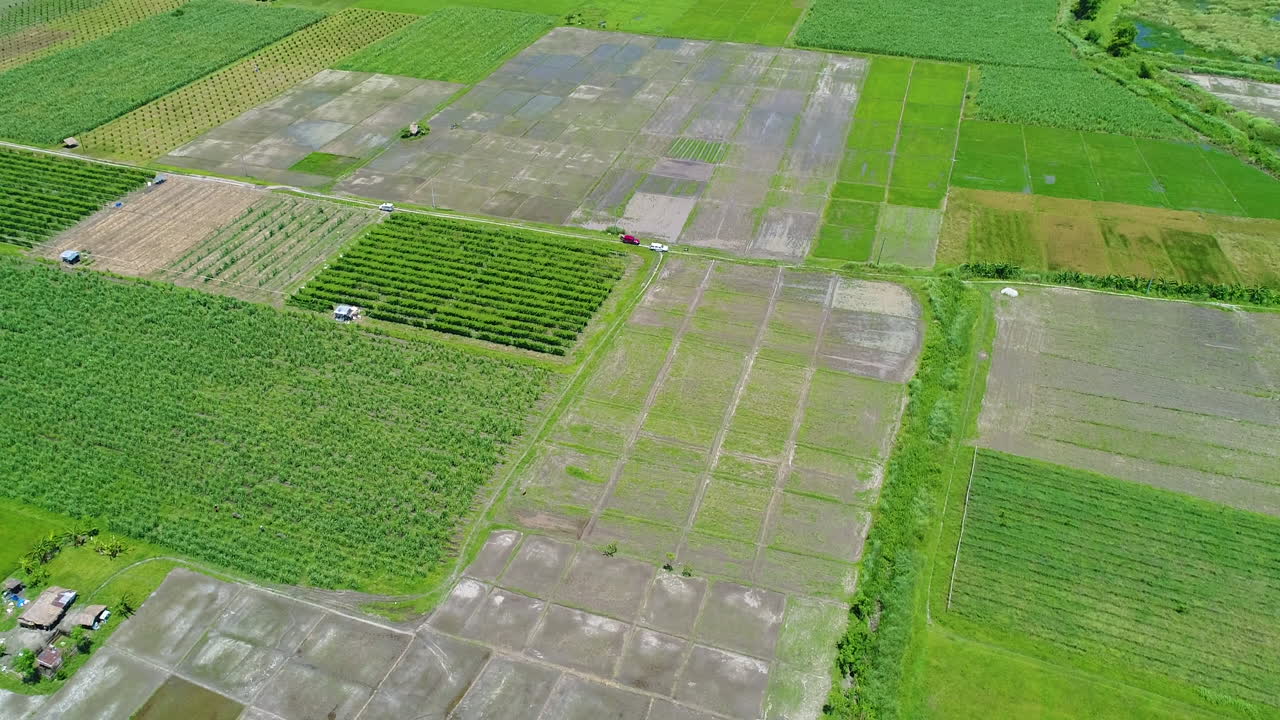Wide Rotating Aerial Shot Of Different Farm Lots