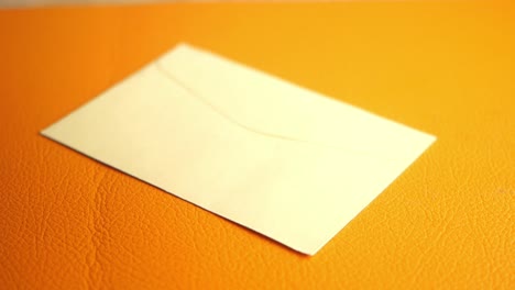 envelopes on an orange surface