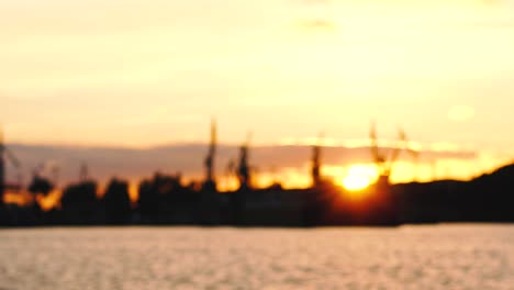 Blurred-view-of-shipyard-at-sunset