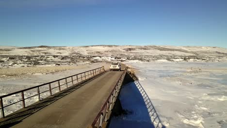 drone follows car in icelandic wilderness