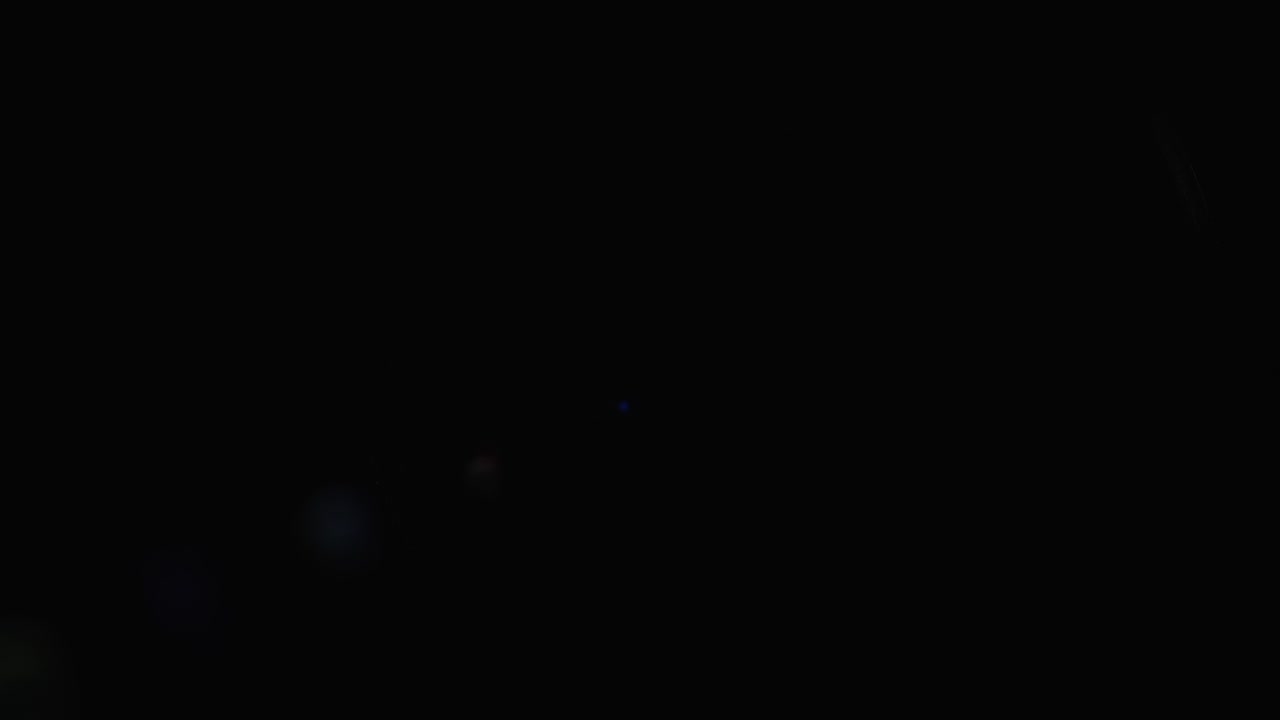 вспышка объектива на профессиональном объективе видеокамеры