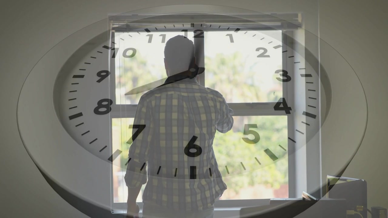 Receiving call, man in plaid shirt holding phone, adjusting window sash at home with clock overlay