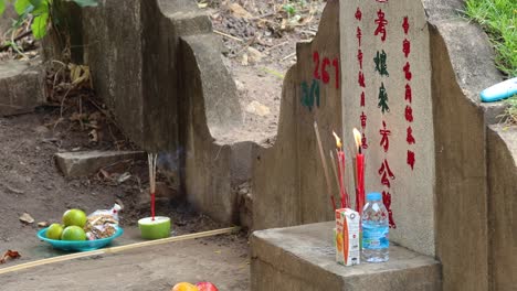 ritual offerings at a traditional ancestral shrine.