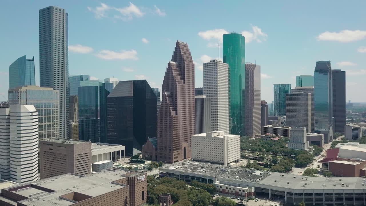 Parallax Aerial Shot of the Downtown Houston Area. Parallax Aerial View over the tall skyscrapers in Houston Texas.