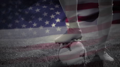 animation of flag of usa over legs of male soccer player