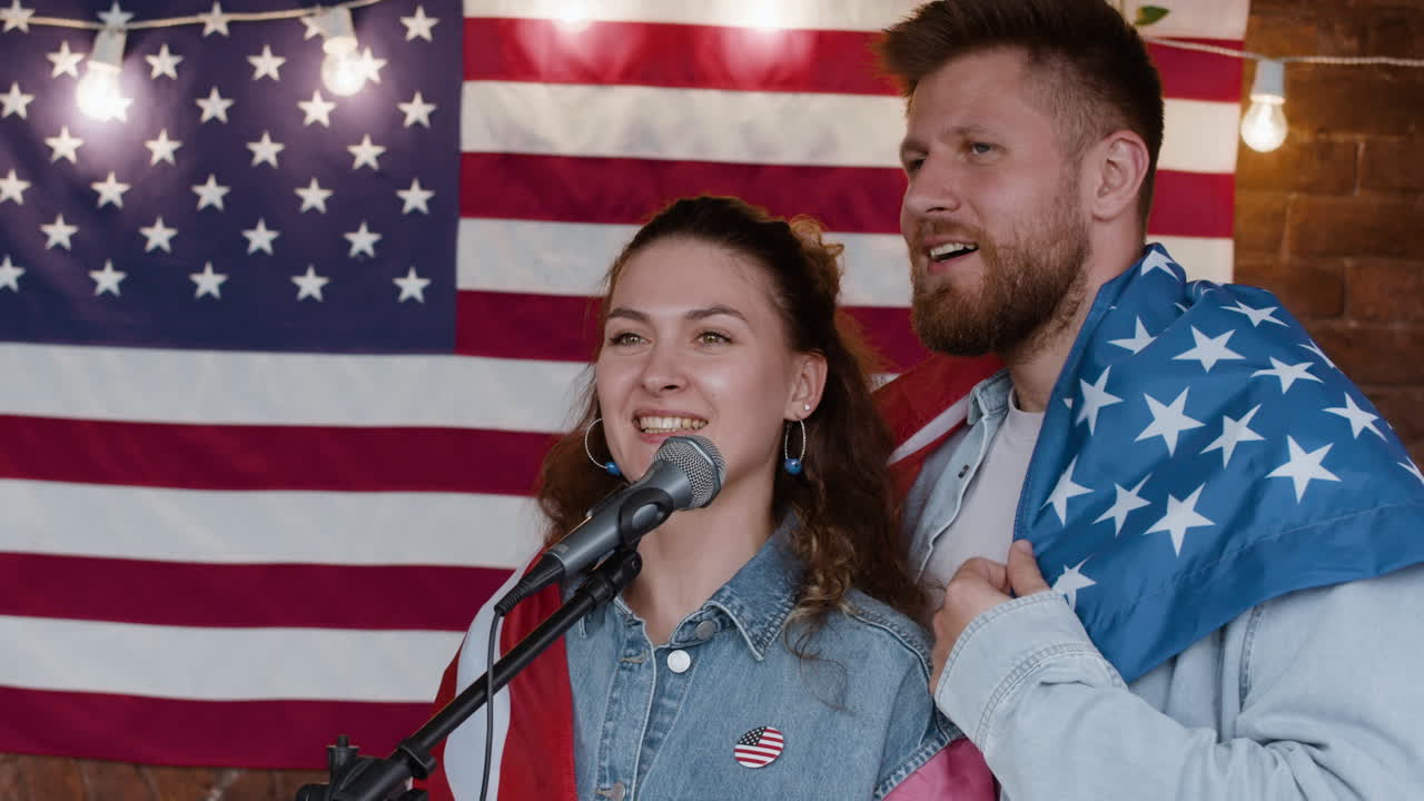 Couple Singing with American Flag