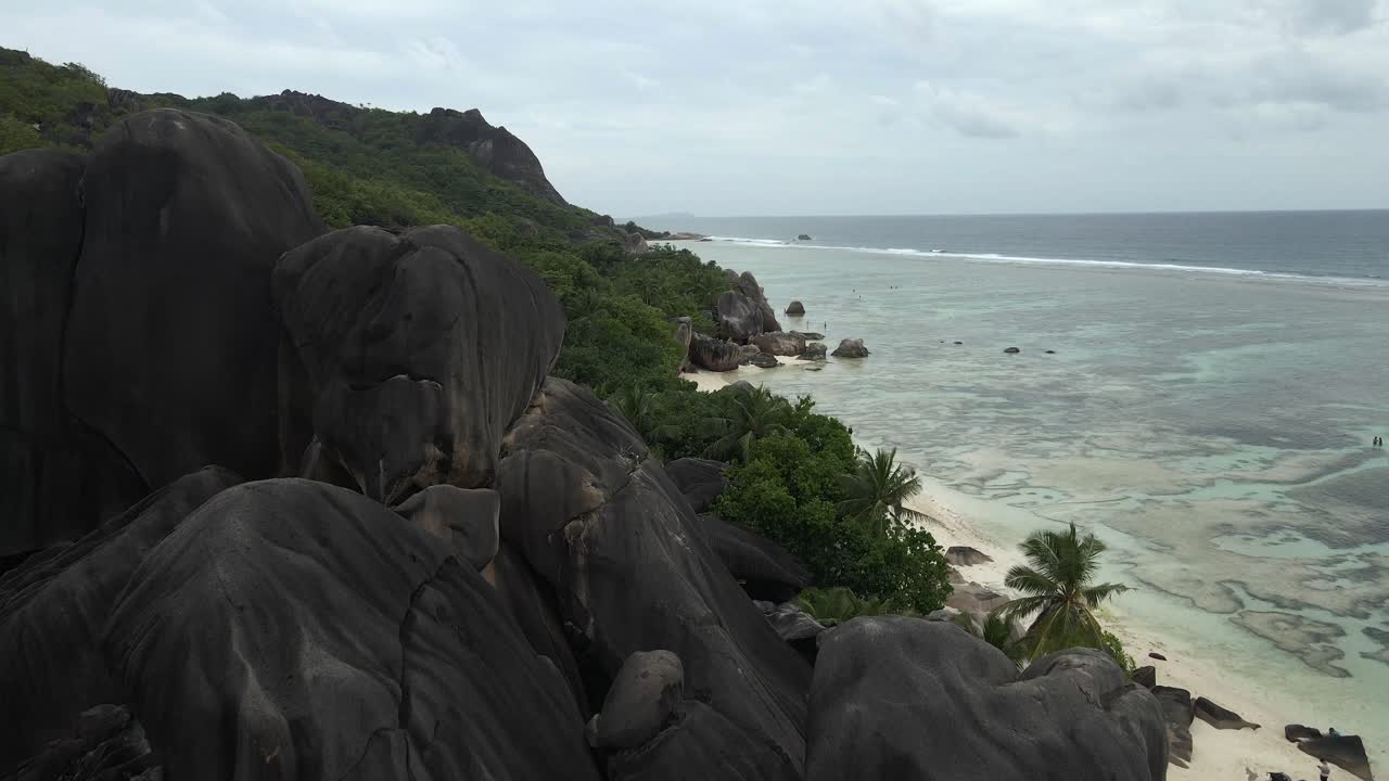Anse Source d'Argent beach on island La Digue in Seychelles filmed from above