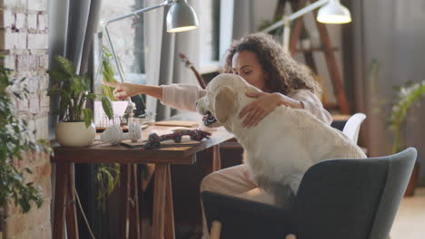 woman working from home with her dog