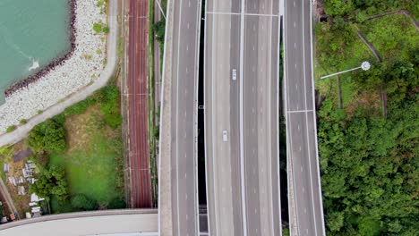 traffic on a rural highway interchange in hong kong, aerial view