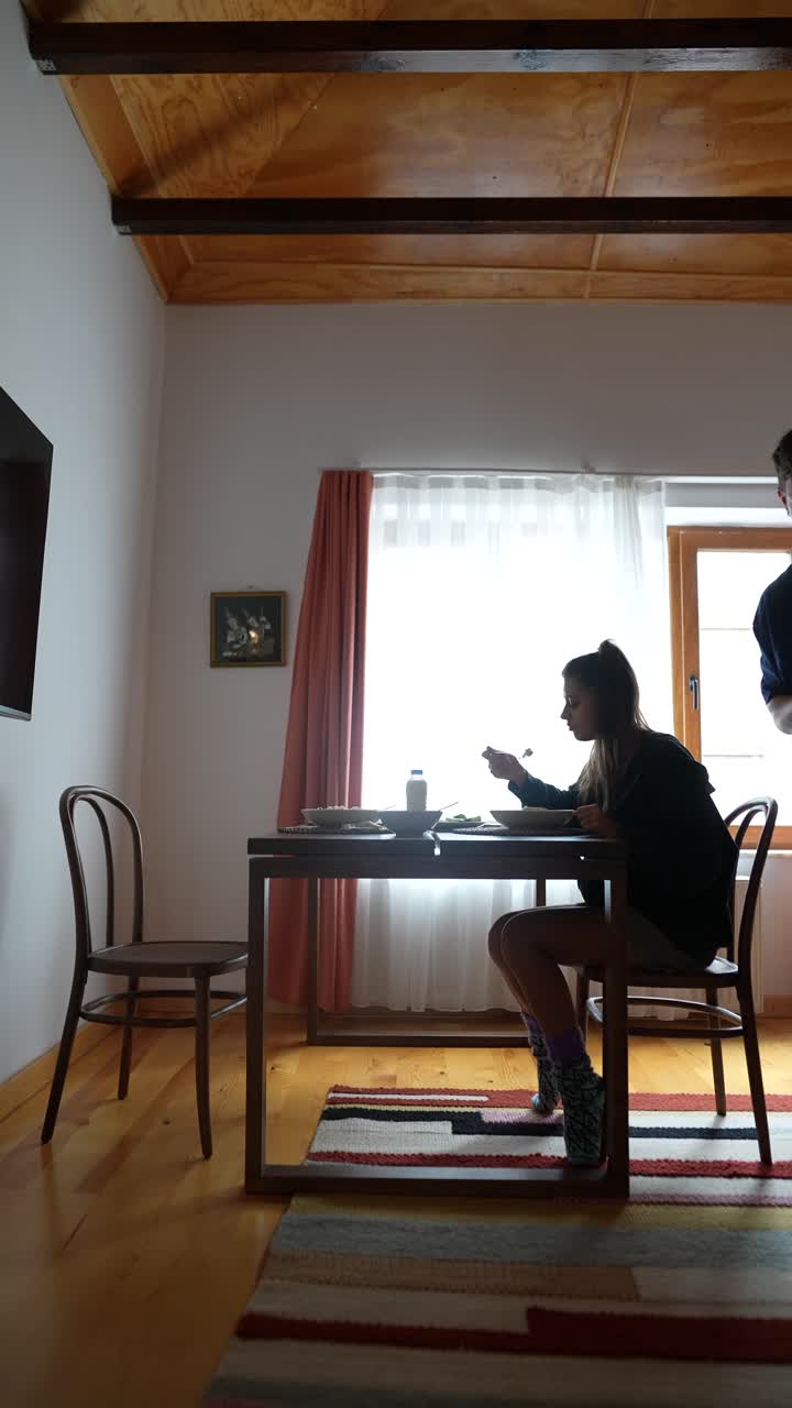 Couple eating together at home