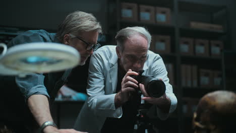 forensic scientists documenting skull