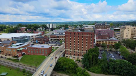 aerial drone footage of downtown jamestown, new york, during summer time on a sunny day