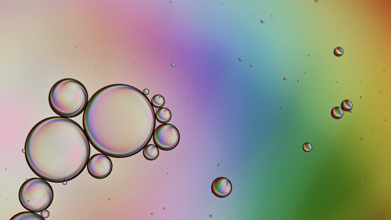 Abstract Colorful Food Oil Drops Bubbles and spheres Flowing