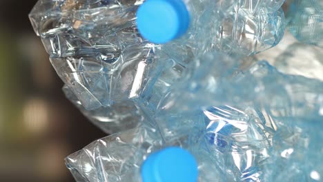 plastic bottles loopable background in vertical in 4k