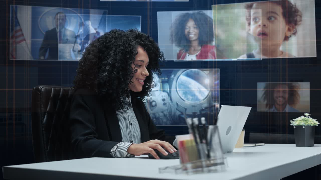 Beautiful Woman with Animated Virtual Background: Manager Sitting at a Table, Using Laptop Computer. Social Media Posts on Walls in Augmented Reality. 360 Degree Tracking Shot. Camera Moving Around.