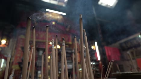 incense burning in a chinese temple, focus in the foreground, rabbit year celebrations