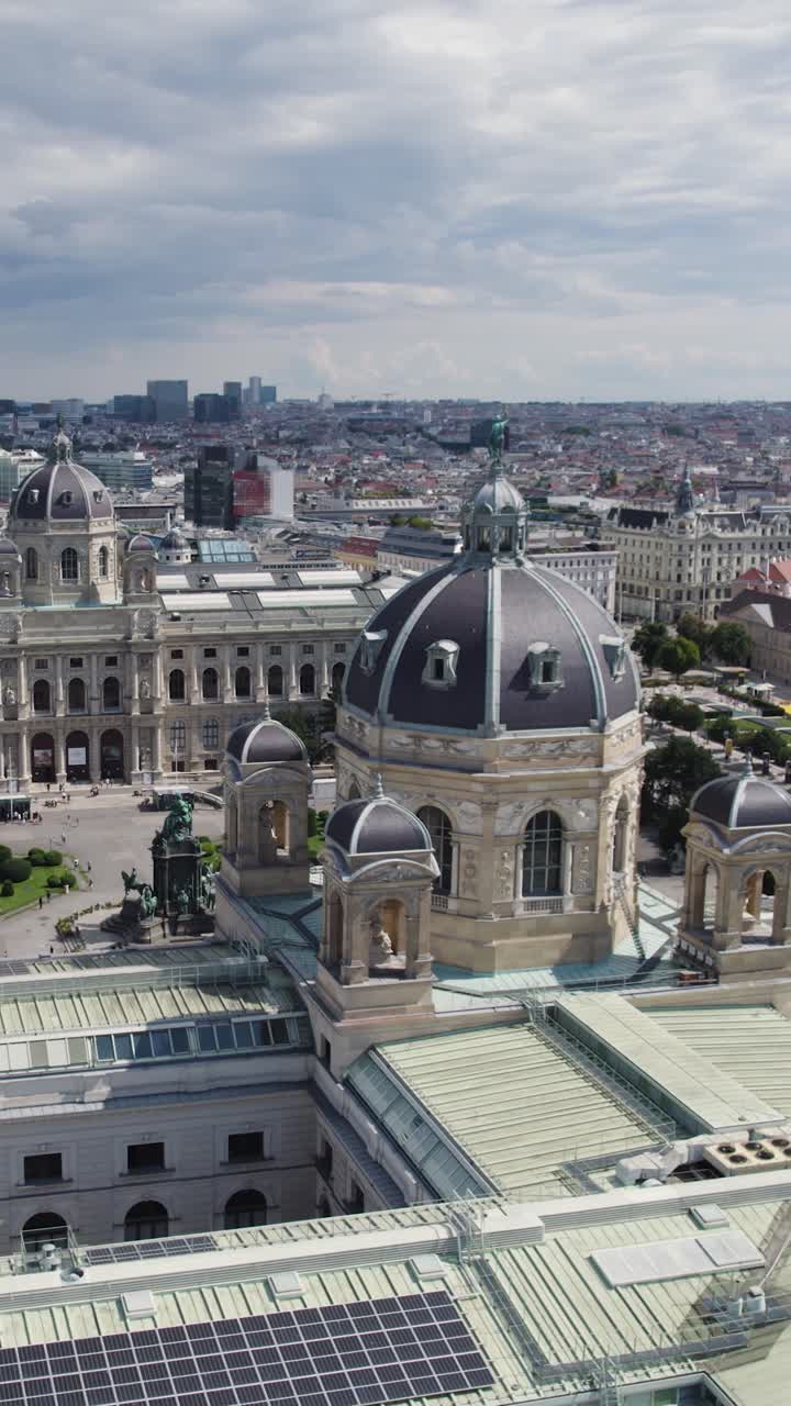 Historic Vienna square and museum dome viewed from above on a partly cloudy day. Vertical Video
