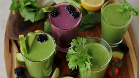 assortment of fresh green and berry smoothies