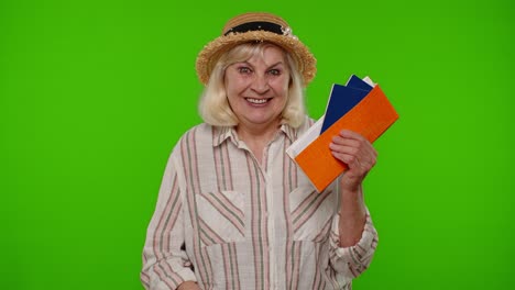 Traveler-tourist-senior-woman-holding-passport-tickets-dreams-of-which-country-go-rest-on-vacation