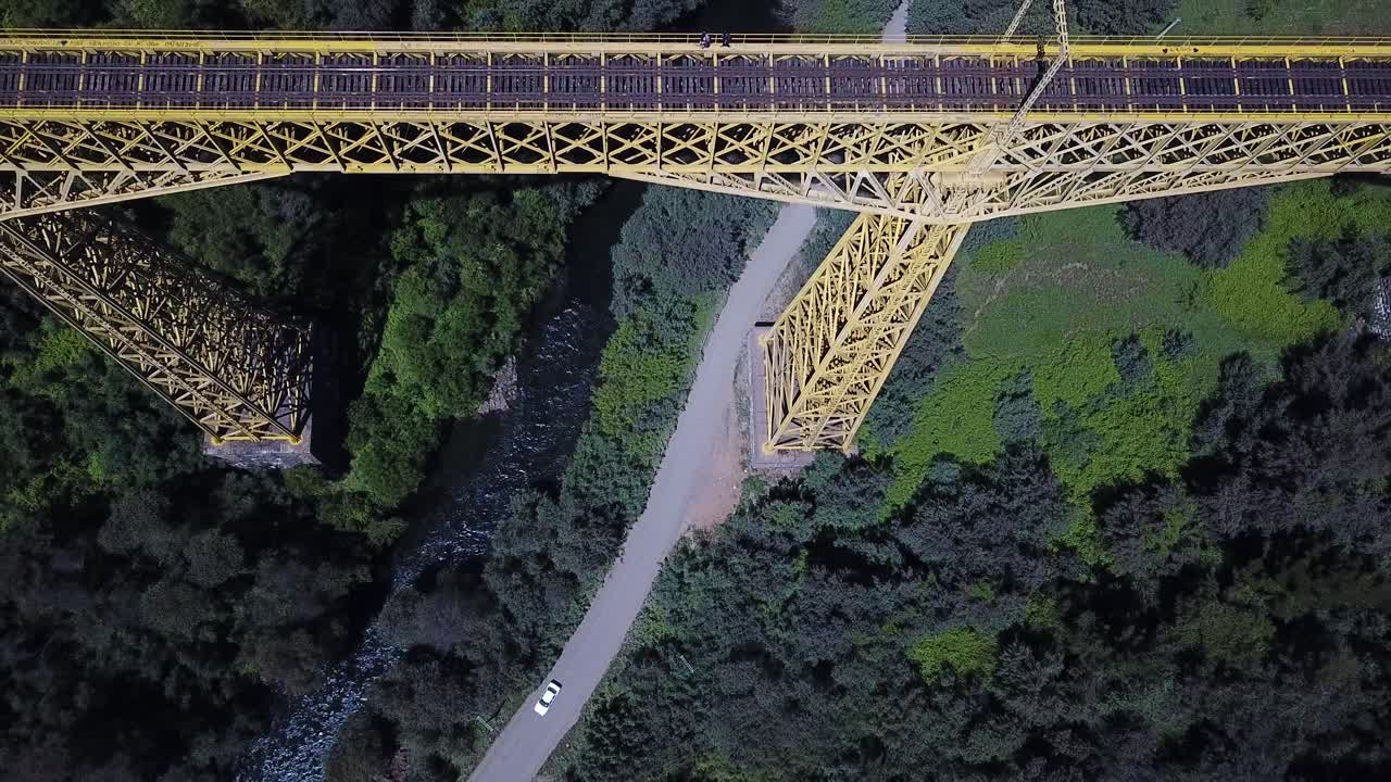 Top Down Aerial View of Car on Road Under Malleco Viaduct, Collipulli, Chile