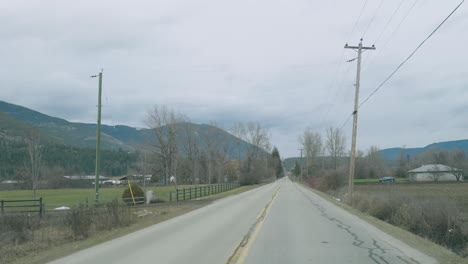 POV-View-From-Windshield-Driving-Through-the-Countryside