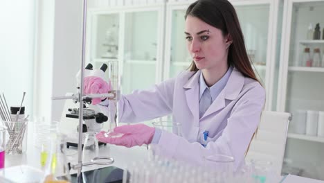 a female scientist conducting research in a laboratory