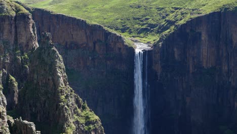 Tall-vertical-Maletsunyane-Falls-at-deep-rugged-rocky-Lesotho-canyon