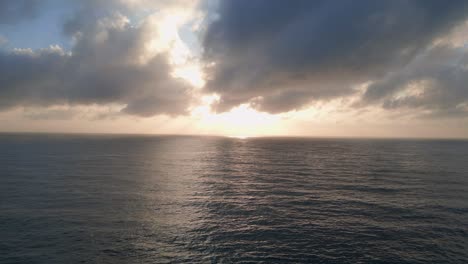 Golden-sunrise-at-the-ocean-horizon,-Dee-Why-Beach,-Sydney,-NSW,-Australia