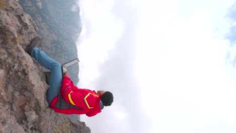 digital nomad man traveling through the mountains