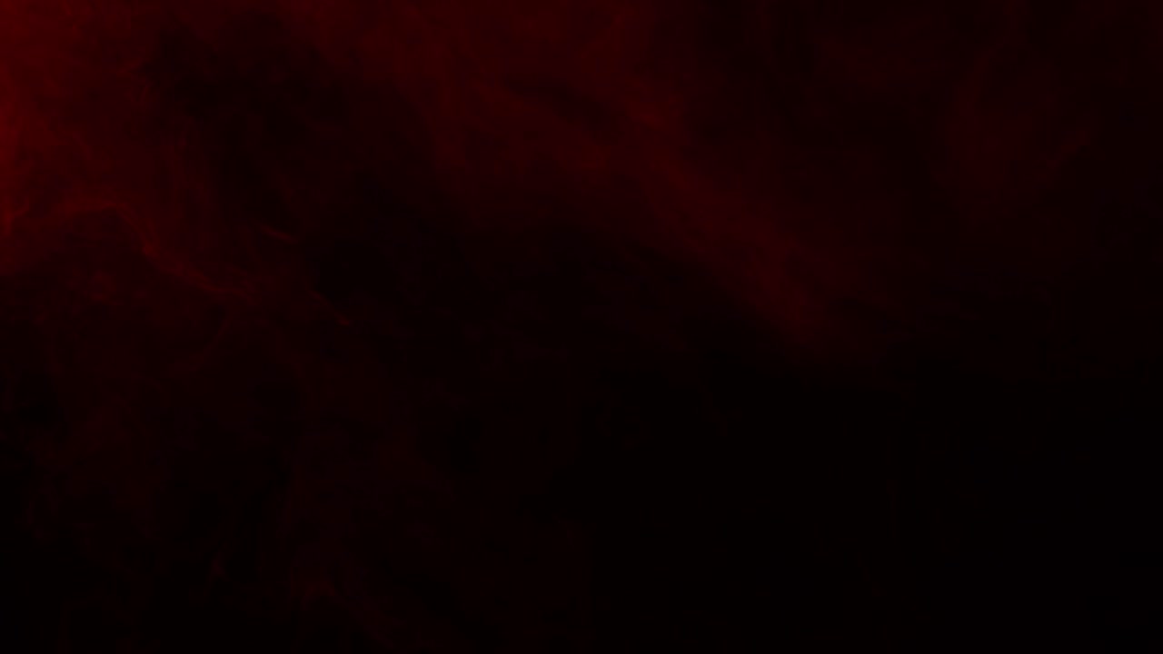 Subtle and soft red fog or smoke drifts slowly across a dark screen. Atmospheric overlay for creating a moody, horror, or dramatic ambiance,vfx