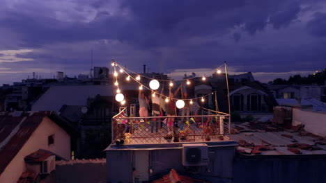 rooftop party under twilight sky